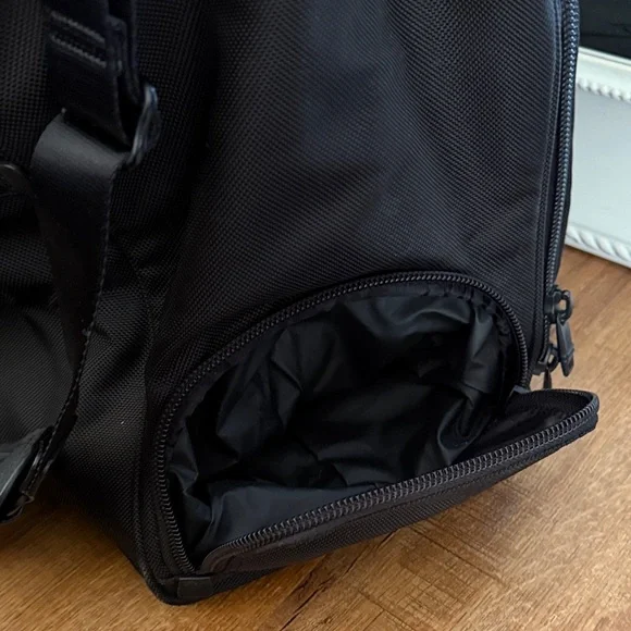 Tumi black travel bag/carryon